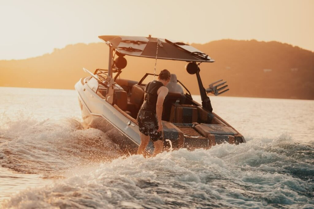 Person water skiing behind boat